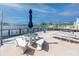 Waterfront patio featuring outdoor seating and serene views at 2011 Ketch Cir, Palm Harbor, FL 34683