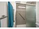 Shower with glass door and grab bar at 2011 Ketch Cir, Palm Harbor, FL 34683