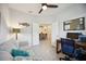 Functional office space with modern decor, a comfortable sofa, and ample natural light at 21008 Fetterbush Pl, Venice, FL 34293