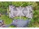 An aerial view of the building layout including parking spaces and surrounding green spaces within the community at 2171 Portofino Pl # 27-2725, Palm Harbor, FL 34683