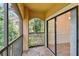 Balcony featuring tile floor, and sliders to the interior living space at 2171 Portofino Pl # 27-2725, Palm Harbor, FL 34683