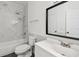 Modern bathroom featuring a shower-tub combo and a white vanity at 2171 Portofino Pl # 27-2725, Palm Harbor, FL 34683