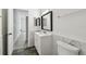 Bathroom highlighting granite counters and wood-look laminate flooring at 2171 Portofino Pl # 27-2725, Palm Harbor, FL 34683