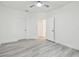 Bedroom showing an open closet and laminate flooring at 2171 Portofino Pl # 27-2725, Palm Harbor, FL 34683