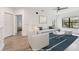 Bright, open living area with a comfortable couch, ceiling fan, and natural light, complemented by stylish decor at 2171 Portofino Pl # 27-2725, Palm Harbor, FL 34683