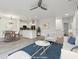 Open-concept living area with dining space, modern finishes, and ample natural light at 2171 Portofino Pl # 27-2725, Palm Harbor, FL 34683