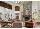 Lobby with stone fireplace and comfortable seating at 2171 Portofino Pl # 27-2725, Palm Harbor, FL 34683