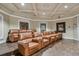 Theater room with tiered seating and leather recliners at 2171 Portofino Pl # 27-2725, Palm Harbor, FL 34683