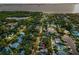 Aerial view of the home in a waterfront community with easy access to canals and the bay at 224 Georgia Ave, Crystal Beach, FL 34681