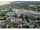 Scenic aerial perspective of the neighborhood's canal-lined streets and waterfront community at 224 Georgia Ave, Crystal Beach, FL 34681
