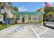 Charming commercial building with colorful accents, ample parking, and historical character at 224 Georgia Ave, Crystal Beach, FL 34681