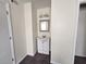 Modest bathroom featuring carpeted flooring and a vanity with a mirror at 2302 Maki Rd # 2, Plant City, FL 33563