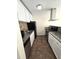 Bright kitchen with stainless steel appliances, granite countertops, and tile backsplash at 2302 Maki Rd # 2, Plant City, FL 33563
