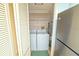 The laundry area has a washer and dryer and a stainless-steel refrigerator at 240 Sand Key Estates Dr # 243, Clearwater Beach, FL 33767