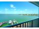 Beautiful water view with boats docked near waterfront homes under a bright blue sky at 240 Sand Key Estates Dr # 243, Clearwater Beach, FL 33767