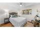 Cozy bedroom with a view from the window featuring a comfortable bed and stylish furnishings at 2460 Northside Dr # 802, Clearwater, FL 33761