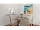 Cozy dining area is adjacent to the kitchen with a view of the breakfast bar at 2460 Northside Dr # 802, Clearwater, FL 33761