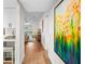 Hallway showcasing the property's updated laminate floors and abundant natural light at 2460 Northside Dr # 802, Clearwater, FL 33761
