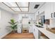Bright, updated kitchen with white cabinets, modern fixtures, and quartz countertop, perfect for cooking at 2460 Northside Dr # 802, Clearwater, FL 33761