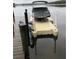 Boat secured on a floating dock, offering easy access to the serene lake for boating and water activities at 2566 Lake Manor Dr, Land O Lakes, FL 34639