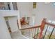 Elegant entryway featuring a staircase with wrought iron railings at 2566 Lake Manor Dr, Land O Lakes, FL 34639