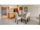 Open floor plan with a dining area and a kitchen with wooden cabinets at 2621 Cove Cay Dr # 302, Clearwater, FL 33760