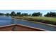Picturesque view of a beautiful lake and surrounding golf course at 2621 Cove Cay Dr # 302, Clearwater, FL 33760