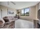 Inviting living room featuring a large window with views and tile floors throughout at 2621 Cove Cay Dr # 302, Clearwater, FL 33760