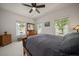 Bedroom with wooden furniture, natural light, and neutral decor at 2900 W Estrella St, Tampa, FL 33629