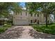 Beautiful two-story home with a spacious driveway, attached garage, and well-maintained landscaping at 2900 W Estrella St, Tampa, FL 33629