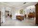 Inviting foyer with tile floors, a glimpse of the dining room, and a staircase leading to the second floor at 2900 W Estrella St, Tampa, FL 33629