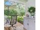 Outdoor living with patio furniture and beautiful lush landscaping at 3101 Beaver Pond Trl, Valrico, FL 33596