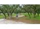 Community playground featuring slides, swings, and climbing structures for children at 3101 Beaver Pond Trl, Valrico, FL 33596