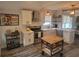 Well-lit kitchen with stainless steel appliances, white cabinets, and stylish decor at 318 W Crest Ave, Tampa, FL 33603