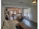 Spacious living room with dining area open to updated kitchen at 318 W Crest Ave, Tampa, FL 33603