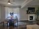 View of the living room and dining area from the kitchen at 318 W Crest Ave, Tampa, FL 33603