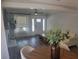 Bright living room with view to dining area and stylish furniture at 318 W Crest Ave, Tampa, FL 33603
