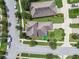 Bird's-eye view of home with neutral-colored roof and well-maintained landscaping on a corner lot at 3257 Heart Pine Ave, Odessa, FL 33556