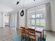 Cozy dining area with natural light and backyard views at 34163 Radley Way, Wesley Chapel, FL 33545