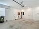 Spacious garage with ample room for storage and parking at 34163 Radley Way, Wesley Chapel, FL 33545