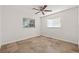 Bedroom with tile floors, white walls, and natural light at 358 Suwanee Ave, Sarasota, FL 34243