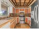 Kitchen featuring stainless steel appliances, ample counter space, and custom cabinetry at 358 Suwanee Ave, Sarasota, FL 34243
