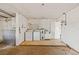 Spacious laundry area with appliances and utility sink, offering practicality and potential for customization at 358 Suwanee Ave, Sarasota, FL 34243