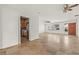 Bright living room featuring tile floors and access to the kitchen at 358 Suwanee Ave, Sarasota, FL 34243