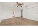 Main bedroom with tile flooring, ceiling fan, closet and en suite bathroom at 358 Suwanee Ave, Sarasota, FL 34243