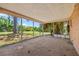 Screened patio overlooking a lush backyard, perfect for enjoying the outdoors in comfort at 358 Suwanee Ave, Sarasota, FL 34243