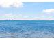 Stunning water view with a clear blue sky and distant cityscape, highlighting the property's scenic location at 358 Suwanee Ave, Sarasota, FL 34243