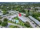 Beautiful condo community with a refreshing pool, lush landscaping, and serene lake views at 4215 E Bay Dr # 1801E, Clearwater, FL 33764