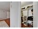 Bedroom walk-in closet with custom shelving and shoe storage at 4215 E Bay Dr # 1801E, Clearwater, FL 33764