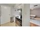 Bright kitchen with stainless appliances and access to bedroom at 4215 E Bay Dr # 1801E, Clearwater, FL 33764